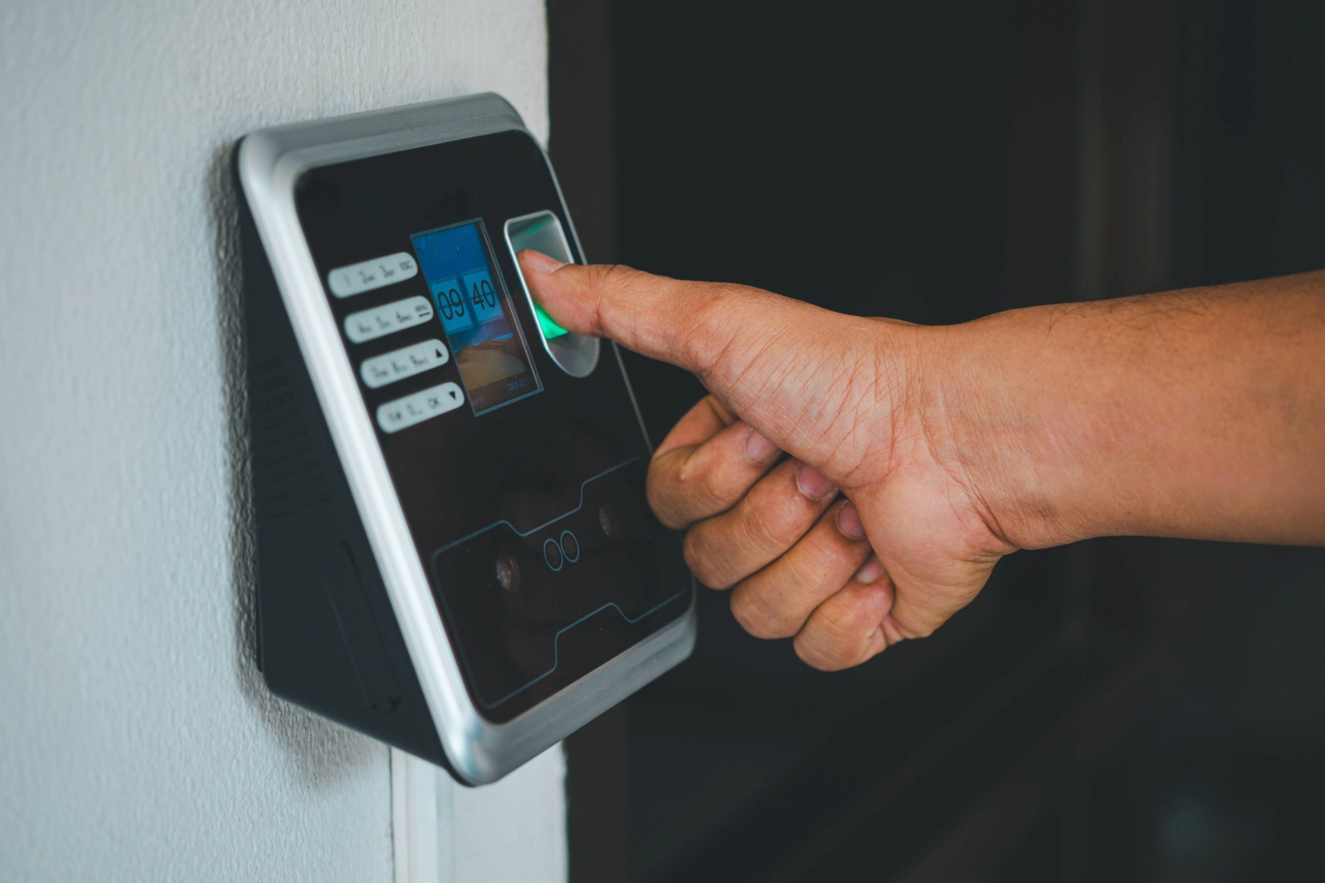 a-person-is-using-a-fingerprint-reader-to-access-a-2025-02-15-08-58-49-utc a-person-is-using-a-fingerprint-reader-to-access-a-2025-02-15-08-58-49-utc