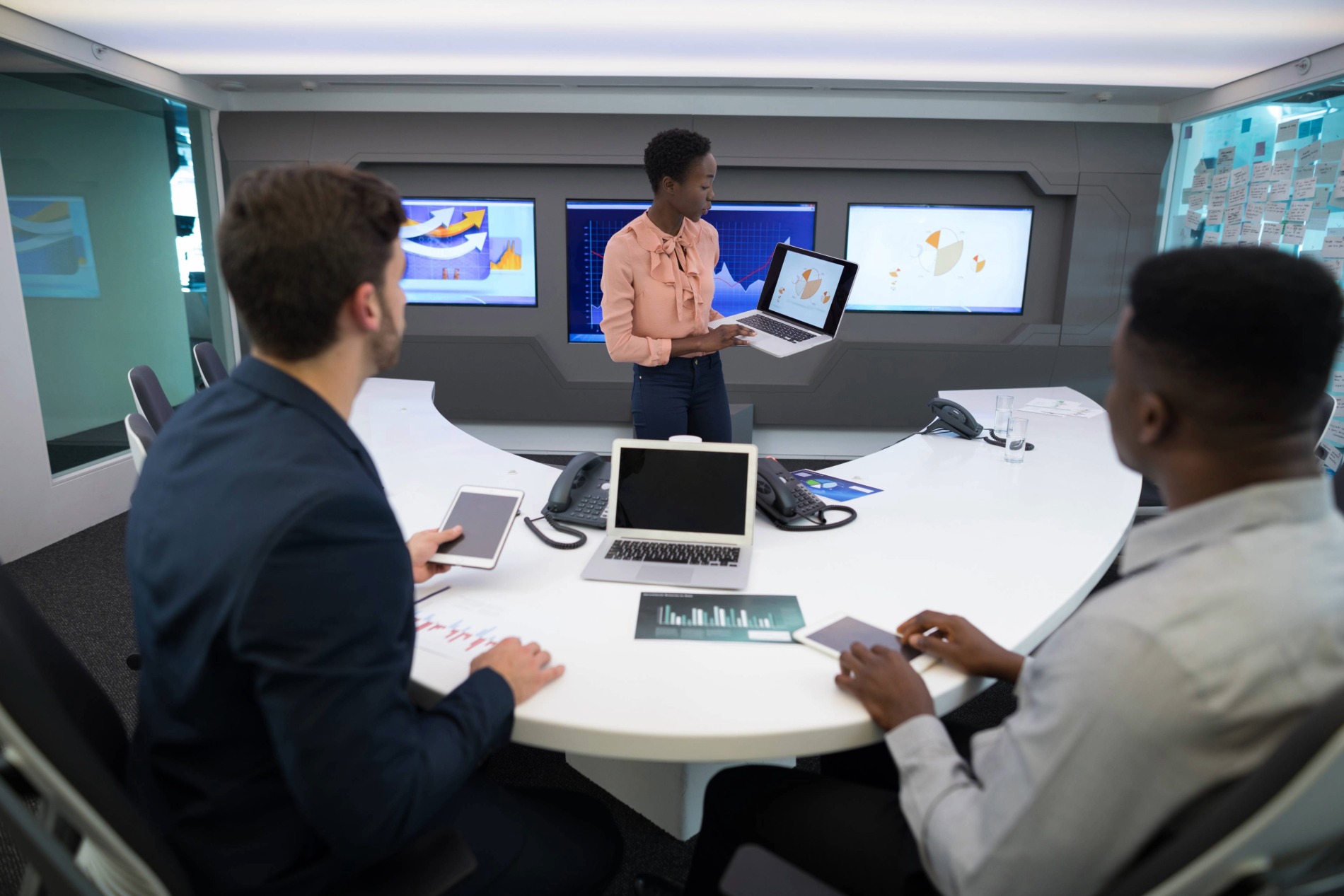 male-and-female-executives-discussing-over-graph-2025-04-04-09-46-18-utc male-and-female-executives-discussing-over-graph-2025-04-04-09-46-18-utc