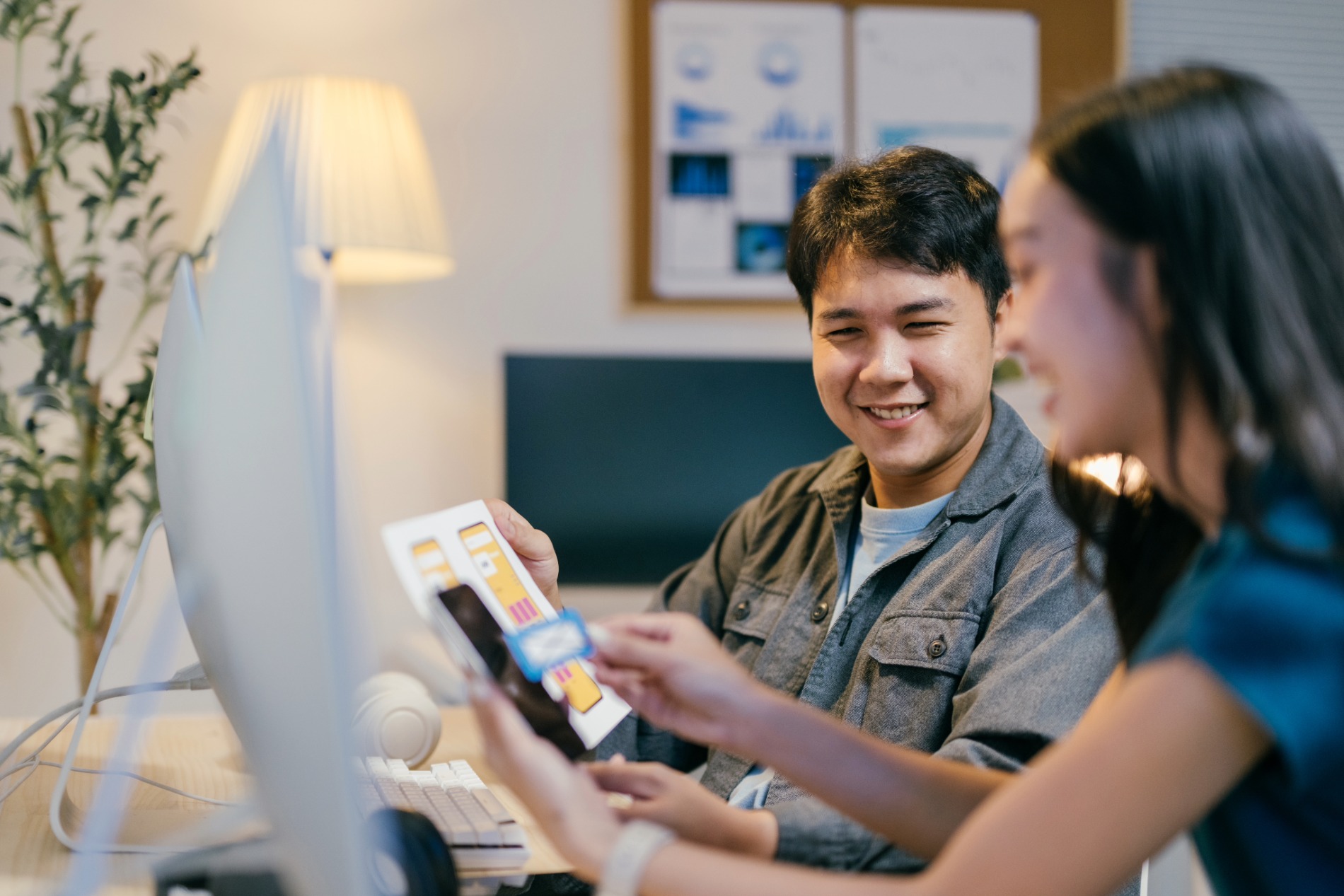 two-young-ui-ux-designers-are-working-together-in-2025-01-16-18-13-26-utc two-young-ui-ux-designers-are-working-together-in-2025-01-16-18-13-26-utc